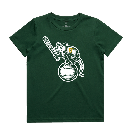 The Oakland Ballers Youth Clutch Tee is a dark green t-shirt showcasing a cartoon opossum wearing a vest with a yellow-detailed white “B,” standing proudly on a large baseball and holding a bat—a fun tribute to the pro baseball team.